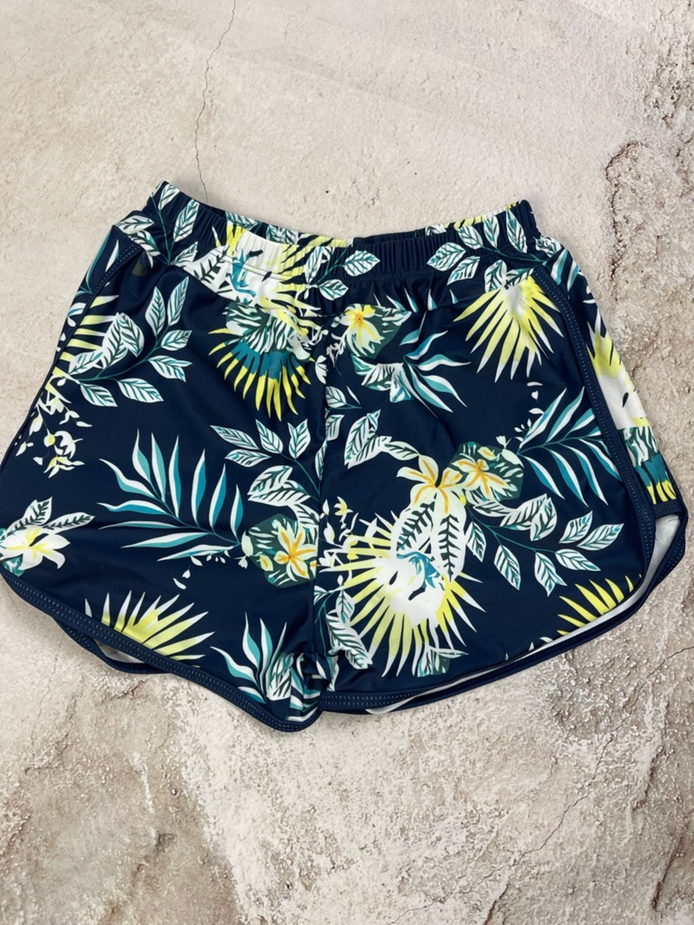 Young Adult Women’s Navy Tropical Print Swim Board Shorts